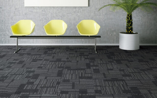 Waiting room with empty picture frame and yellow chairs