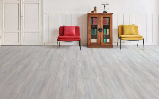 modern home interior living room style design with wooden table armchair chair pillow cushion and blanket parquet floor rug frame window armchair lampshade